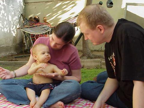 [Joshua's first taste of birthday cake.]